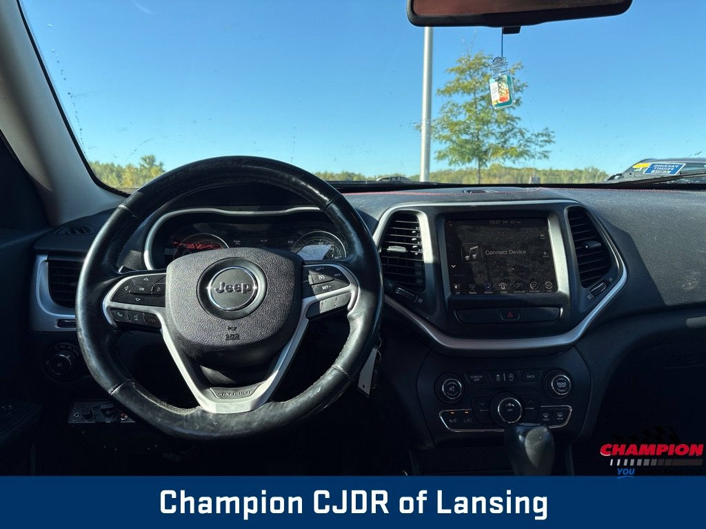 Used 2016 Jeep Cherokee Trailhawk with VIN 1C4PJMBS9GW131078 for sale in Lansing, MI