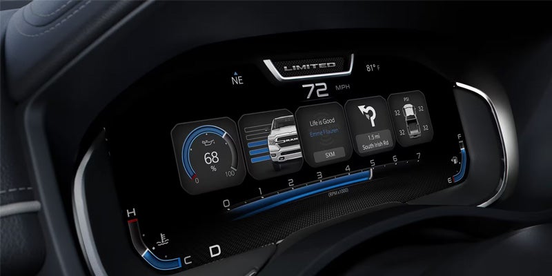 Digital dashboard displaying speed (72 MPH), temperature, compass, oil life (68%), audio, navigation, and tire pressure.